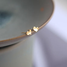 3D-Wellenherz-Ohrringe in Gold