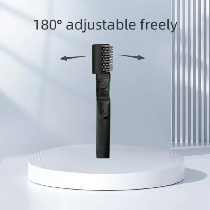 Electric BBQ grill brush standing upright showing its adjustable tilting head