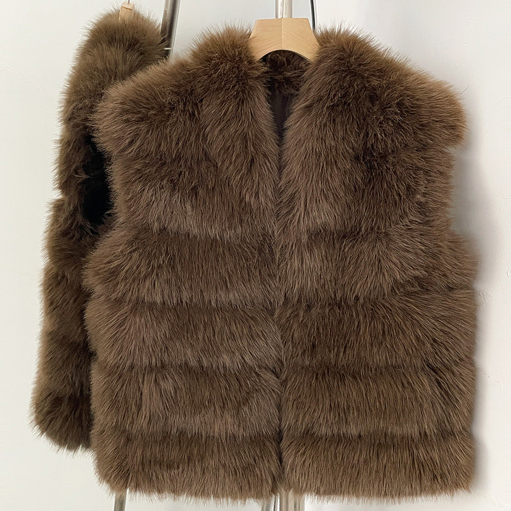 Brown tiered vegan fur sleeveless vest in size S, front view on a wooden hanger