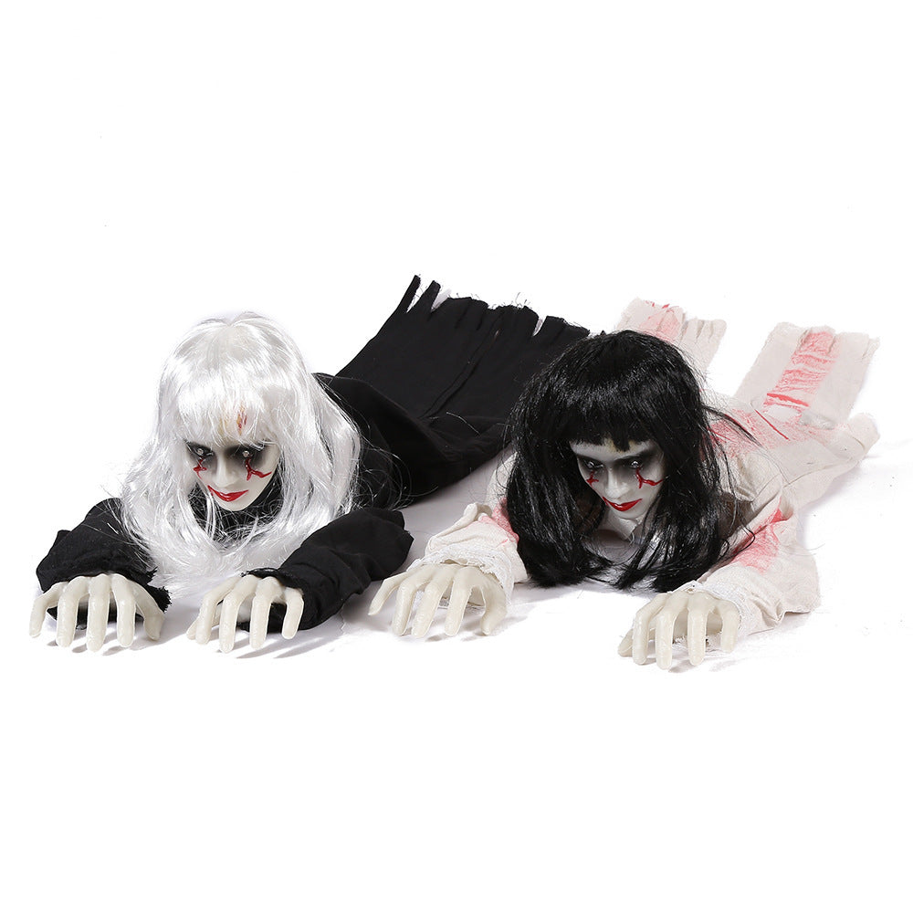 Pair of crawling Halloween ghost props, white-haired ghost in black rags beside a black-haired ghost in white