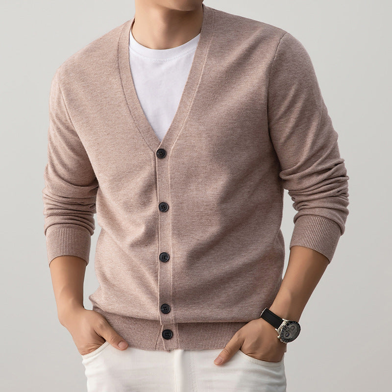 Bean green V neck button cardigan worn open over a white tee by a model