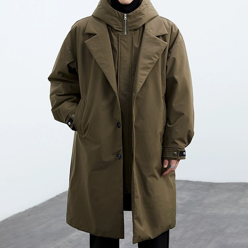 Olive army green mid-length hooded coat with notch lapels and an inner zip layer, front view, worn over a black roll neck
