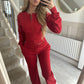 Womens two piece lounge set, a front zip jacket and straight leg drawstring pants in a soft sweat knit