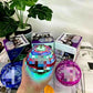 Flying spinner toy set on a flat surface beside its USB charging cable