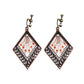 Bohemian vintage clip-on tassel drop earrings on a zinc alloy frame, handmade boho pair on white studio background
