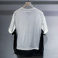Color block panel t-shirt showing the drop shoulder cut and short cuffed sleeves