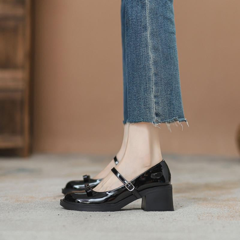 Side profile of low square block heel Mary Jane shoe with slim toe platform