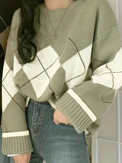 Matcha green argyle knit sweater with cream diamonds, close view of the round neck and ribbed cuffs, worn with jeans