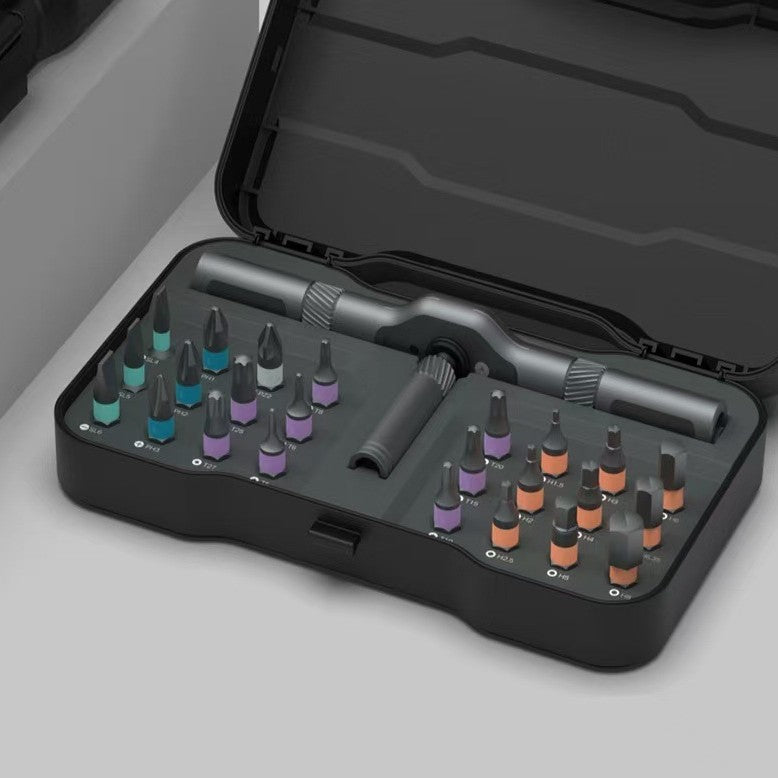 Close view of the bit tray, colour collared bits seated beside their printed size labels