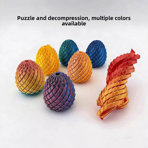 Several 3D printed dragon egg fidget toys in metallic colors on a white background