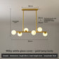 Gold pendant light with six milky white glass shades, 80 cm long, 62 cm high, 3-color LED option