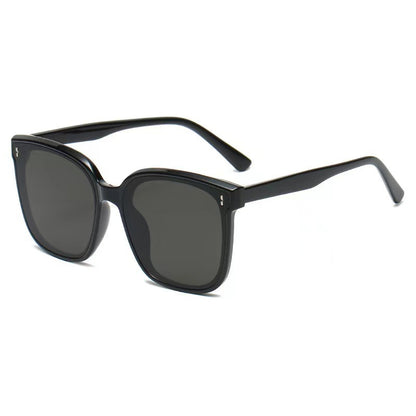 Black square frame sunglasses with grey polycarbonate lenses on a white background