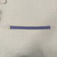Single purple elastic quick release tourniquet band laid flat with its white snap buckle