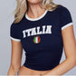Country soccer baby tee front view with arched lettering and flag graphic