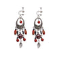 Handmade bohemian clip-on earrings with tassel and bead drop detail, zinc alloy frame, studio shot on white background