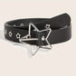 Black PU belt with silver open star buckle and star studs coiled on beige