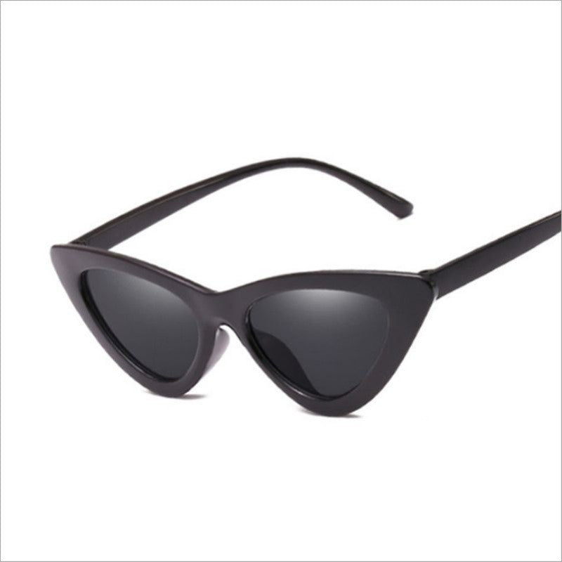 Black triangular cat eye sunglasses with gray tinted PC lenses shown on a white background