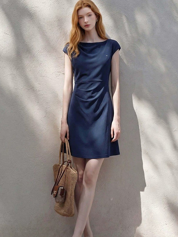 A-line cap sleeve ruched waist mini dress in soft stretch knit, close up of the side ruched high waist