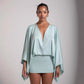 Side profile of the A-line mini dress showing how the skirt flares from the waist