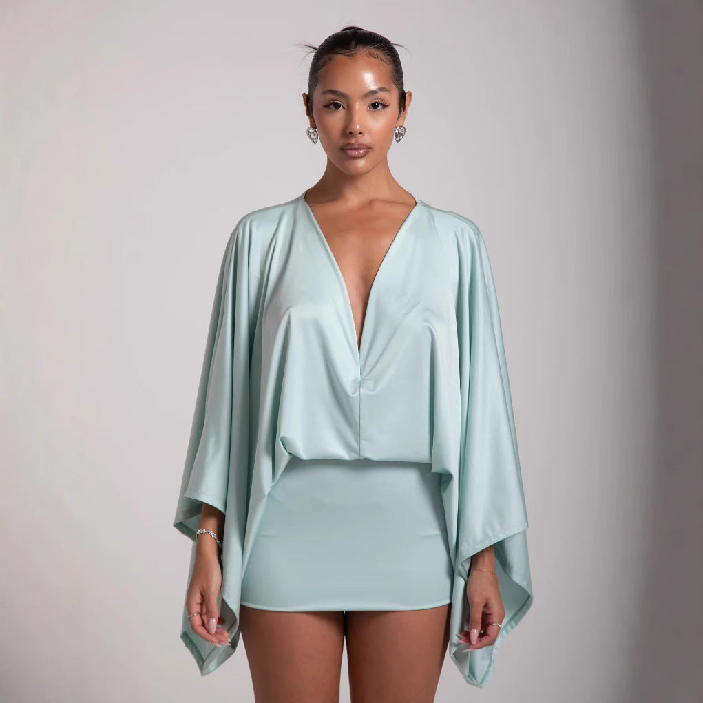 Side profile of the A-line mini dress showing how the skirt flares from the waist