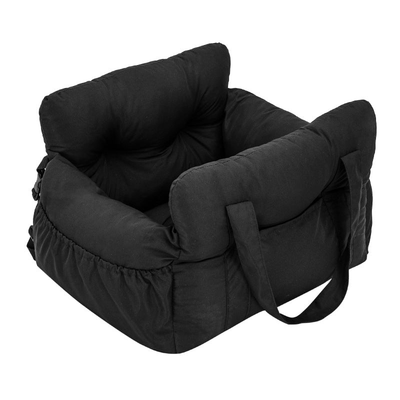 Padded car seat pet bed with raised bolster walls, carry handles and an inner clip in the olive canvas colourway