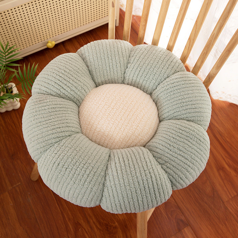 Flower shaped plush seat cushions in yellow, grey, pink and green