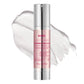Balm stick beside ceramide serum on vanity tray