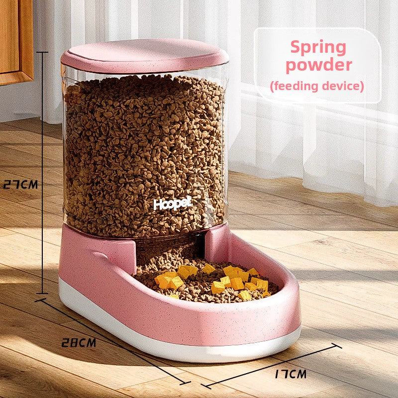 Gravity pet feeder shown from the side with the clear kibble reservoir
