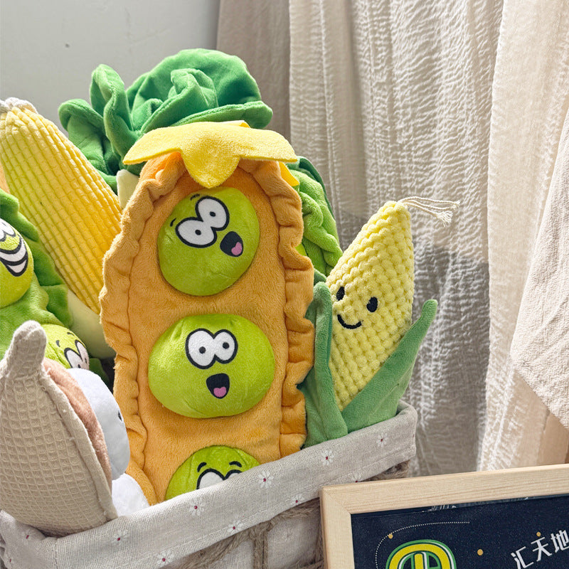 Plush squeaky dog toy in a textured corn velvet body, one design from the assorted shape range