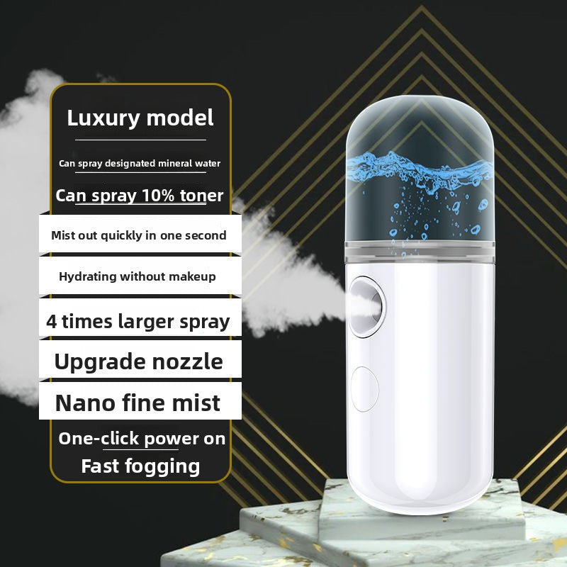 Pink nano facial mister on stone with feature notes on the fine nano mist