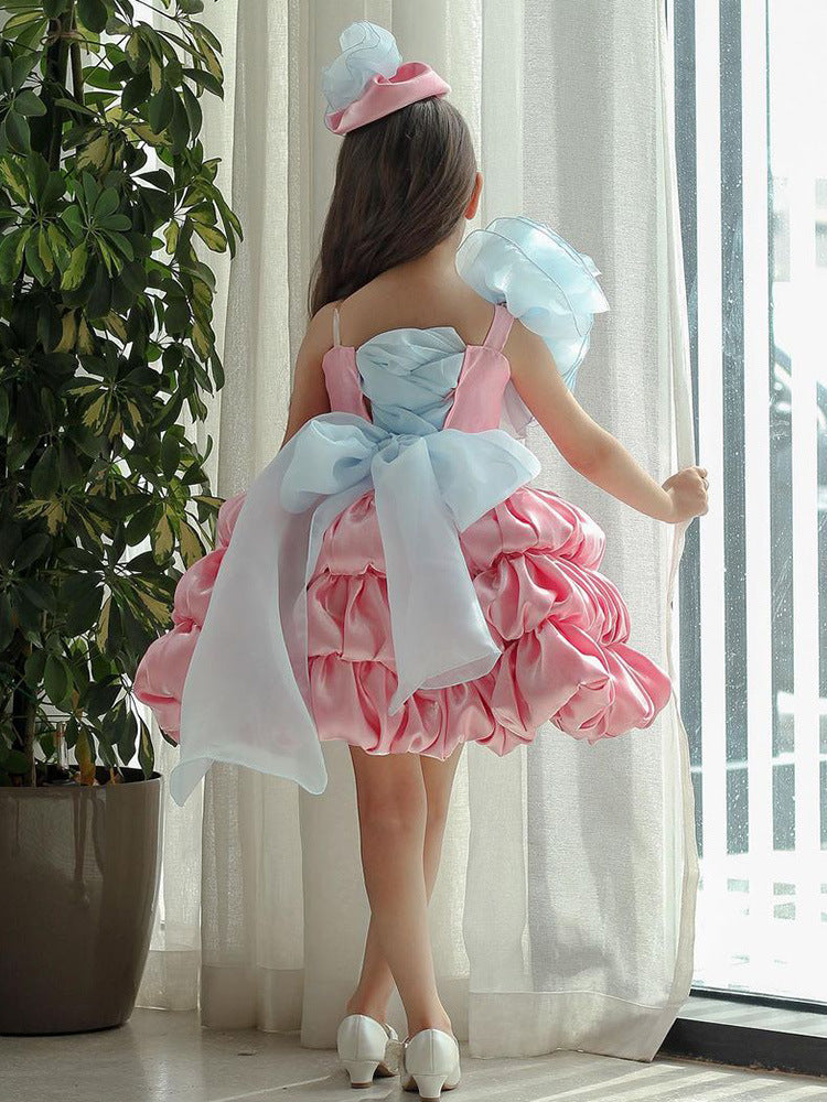Close up of pink fabric and bodice on the princess bow dress
