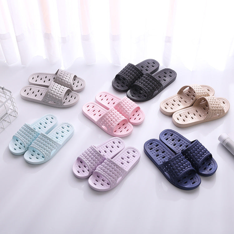 Quick-dry bath slippers worn on wet bathroom tile after a shower