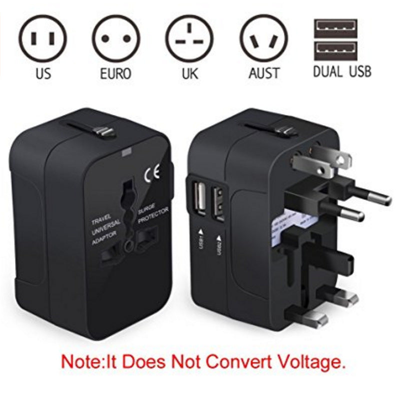 Dual USB universal socket adapter plugged into a wall outlet charging a phone