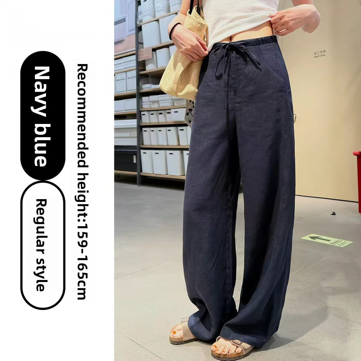 Womens high waist wide leg linen blend drawstring trousers, the white navy blue and black colourways together