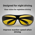 Black wraparound glasses with yellow lenses and the text Designed for night driving on a gray background
