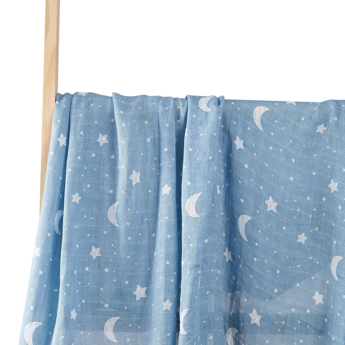 Soft cotton muslin gauze baby blanket shown folded, revealing the light open double layer weave