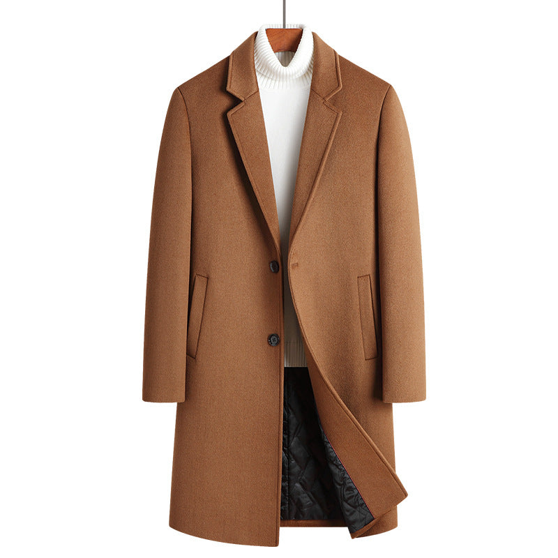 Camel single-breasted long coat with notch lapel on a hanger over a white turtleneck, front view