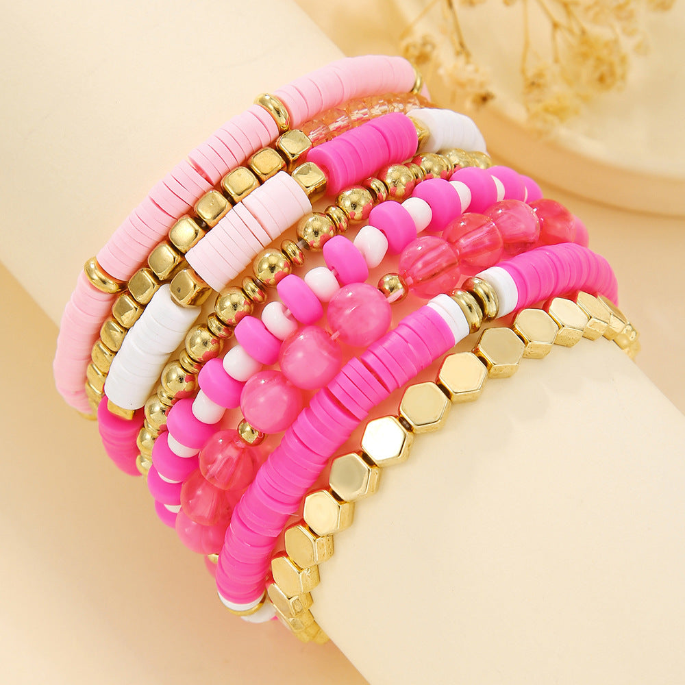 Coordinating beaded bracelet strands laid out together showing the full set