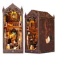 Front and side views of the Magic Library wooden book nook showing shelves, a stair, a candle lit desk and a carved roof