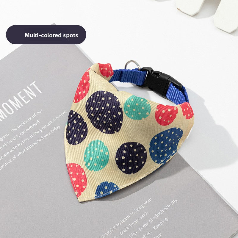 Printed triangle dog bandana on an adjustable nylon collar