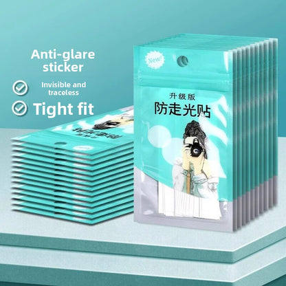Stacked teal resealable pouches of transparent anti-exposure clothing fashion tape strips, upgraded version