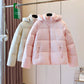 Fleece lined hooded puffer jacket with a rounded quilted silhouette and full zip