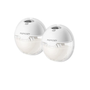Two white wearable electric breast pumps on a plain background with display and button
