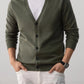 Light gray V neck button front cardigan shown on a model over a plain tee