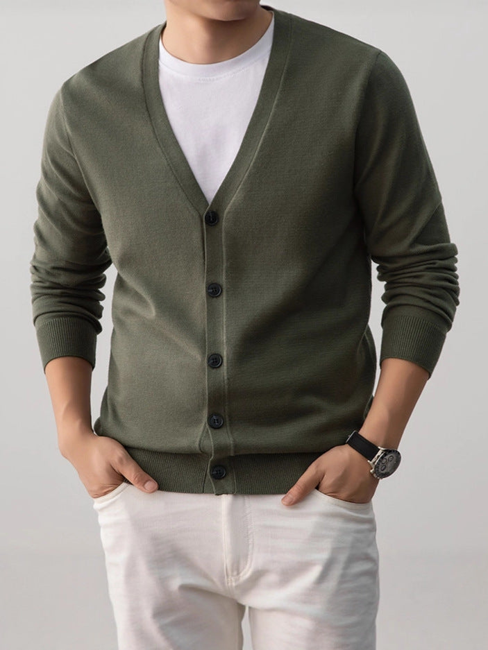 Light gray V neck button front cardigan shown on a model over a plain tee