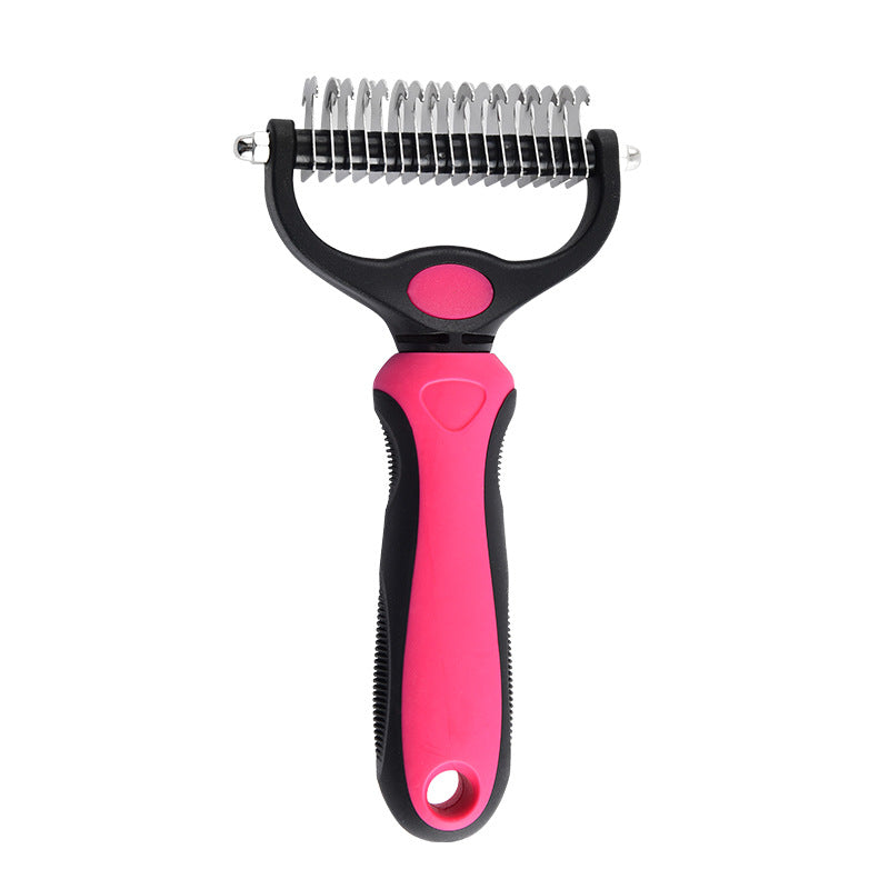 Wider spaced side of the pet comb blades working through a mat in a long coat