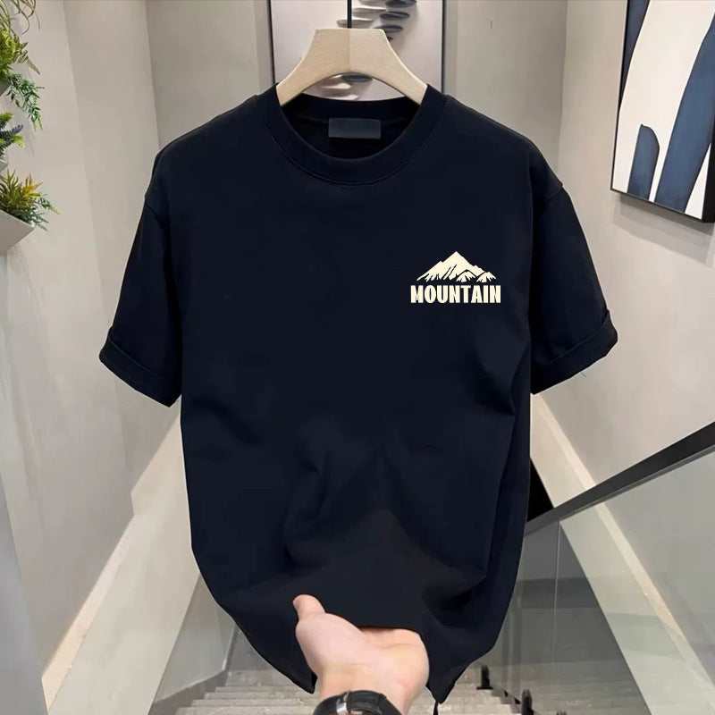 Black crew neck T-shirt with white mountain peaks and a MOUNTAIN print on the chest, option photo for size 2XL