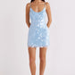 Blue sequin bodycon dress on a clean studio background showing the full silhouette