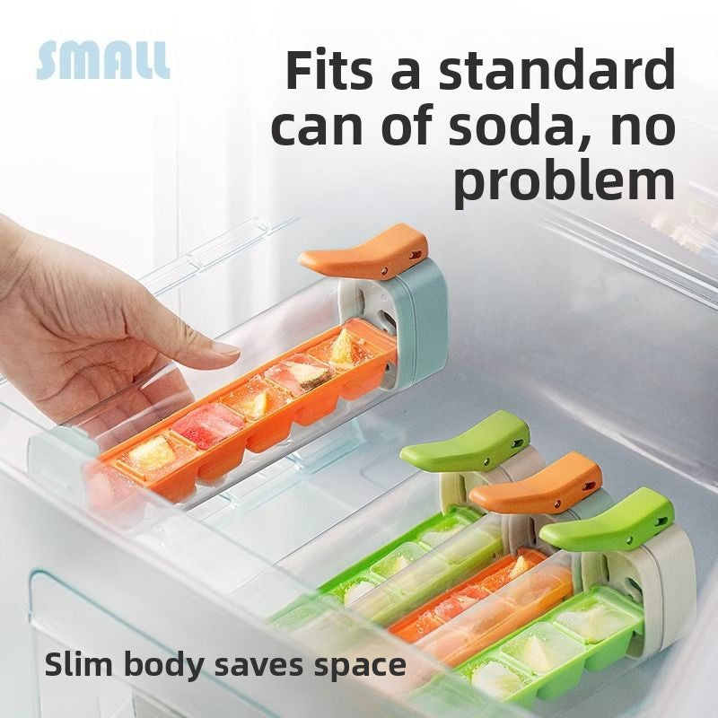 Slim tube ice cube tray lying in a fridge door beside cans, orange and green handles, space saving format
