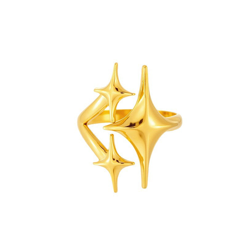 Single gold star cluster ring on white showing the open split band